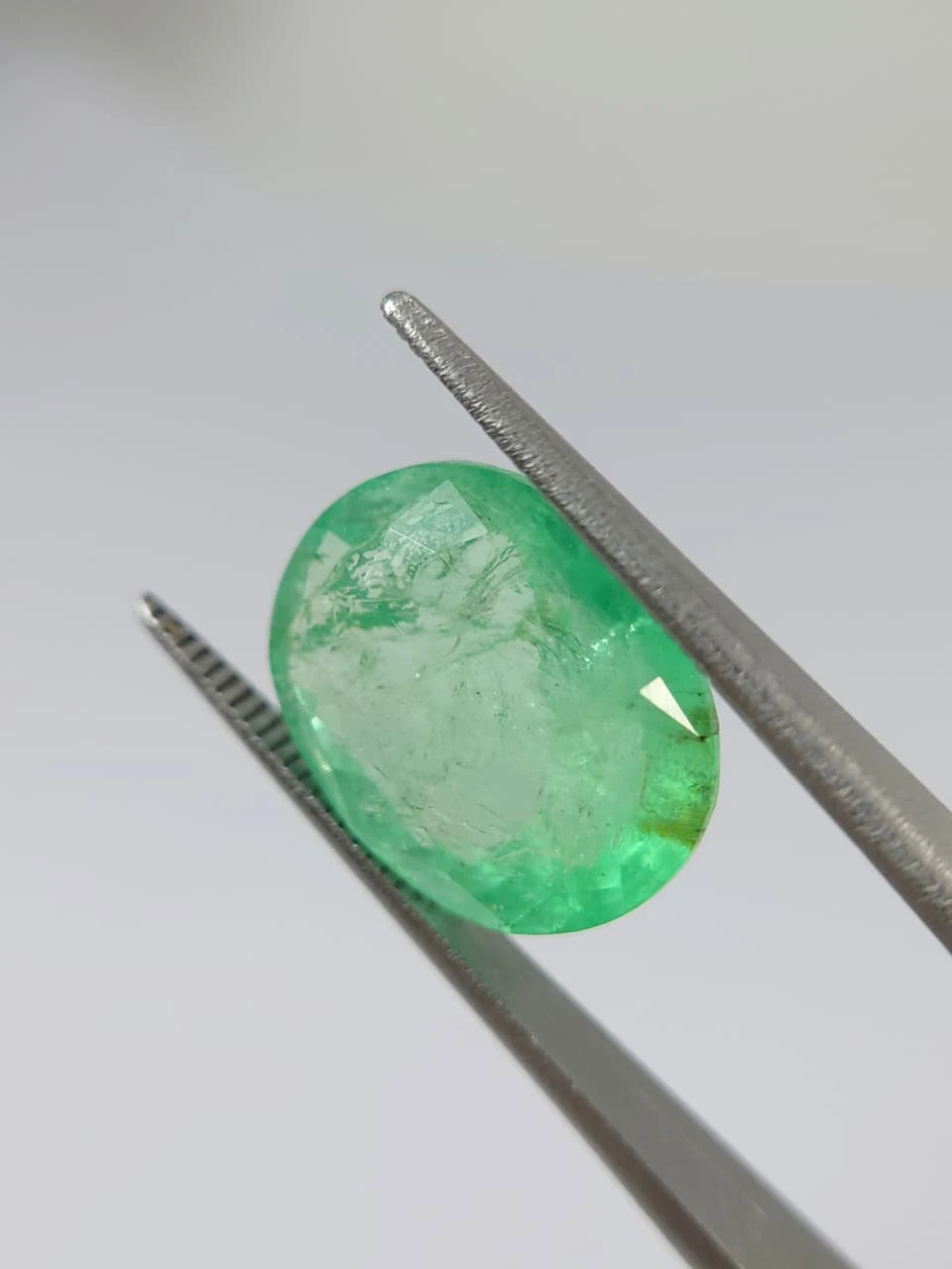 7.7ct Oval Faceted Minor Oiled Panjshir Emerald from Afghanistan — view 3